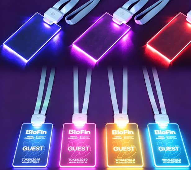 Event staff with distinct LED lanyards for identification
