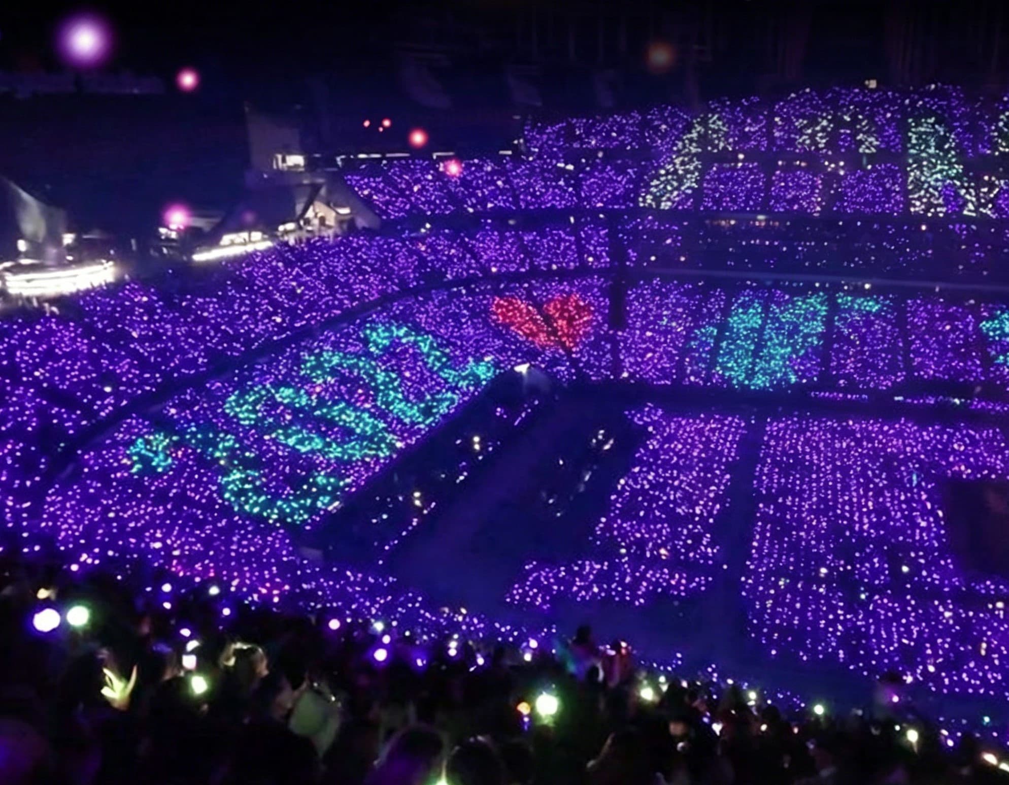 LED light bracelet deployed at a stadium concert with synchronized lighting effects