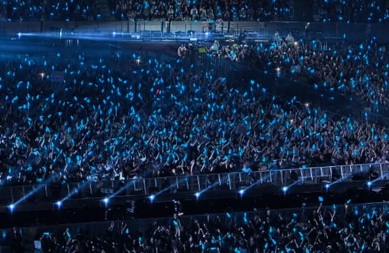 Concert glow sticks – festival night crowd with LED sticks