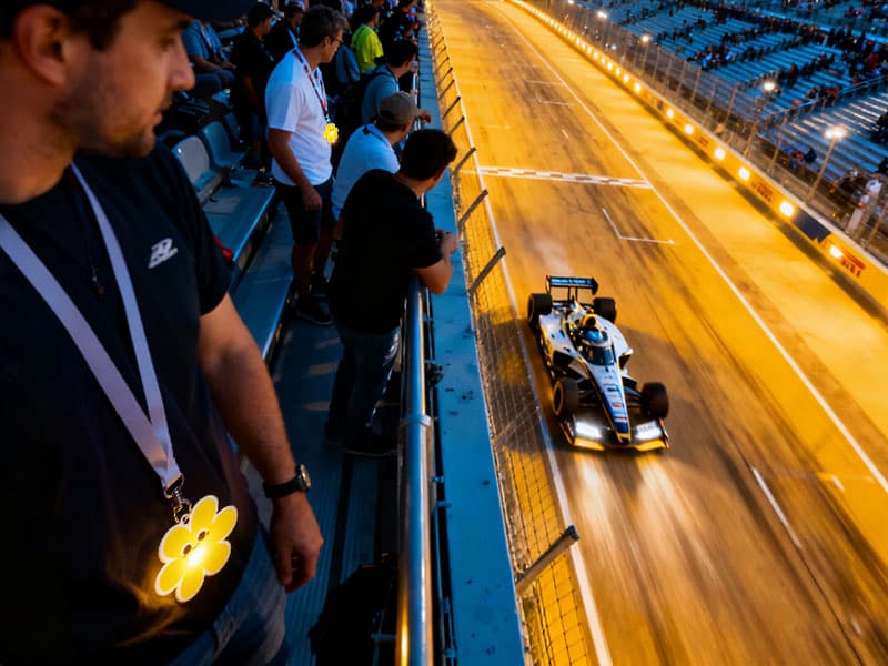 Event staff wearing fast flashing LED lanyards for safety and crew identification