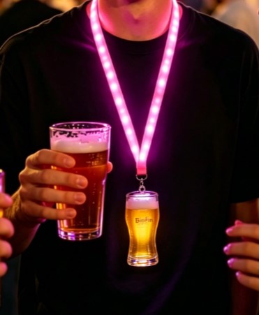 Round medal lanyard with LED perimeter lighting creating a full circular light display around the badge