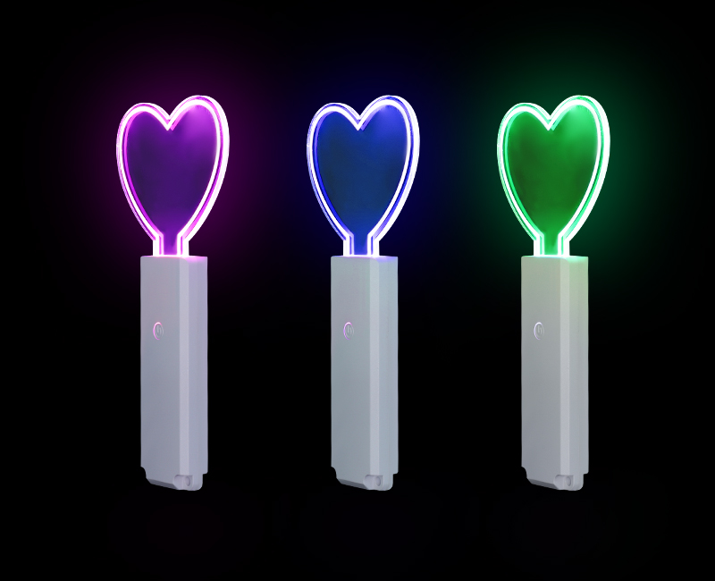 GFE005 acrylic flat glow stick laser cut into a custom geometric crest emblem shape glowing cyan