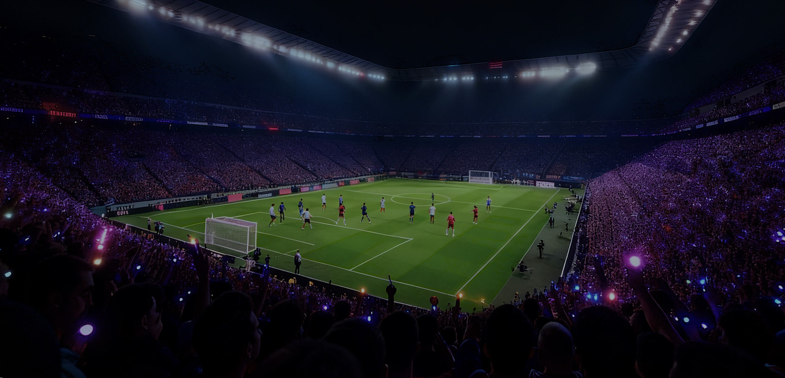 Massive outdoor football stadium completely filled with glowing blue LED wristbands during an open air pop concert tour